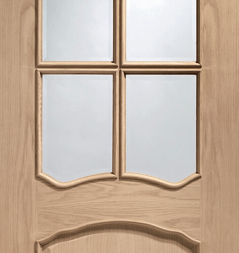 Internal Oak Riviera Door with Clear Bevelled Glass and Raised Mouldings